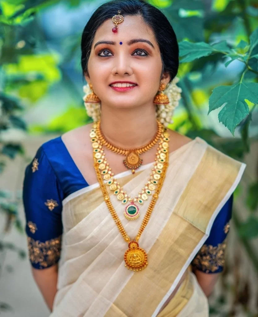 Stunning South Indian Bride In Chokers With Kanjeevaram Sarees