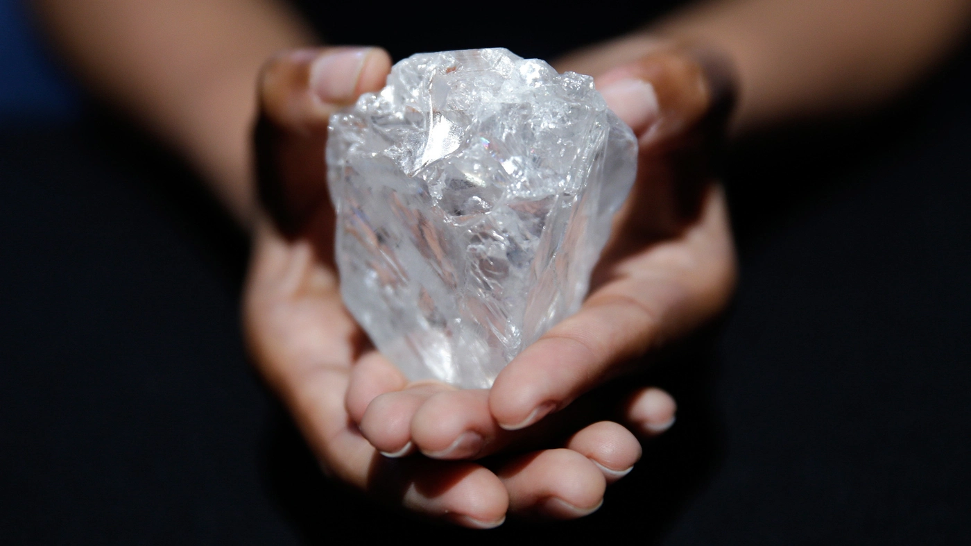Diamond held in palms