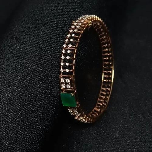 Embellishing Emerald Embedded Diamond Bangle By Chungath Jewellery